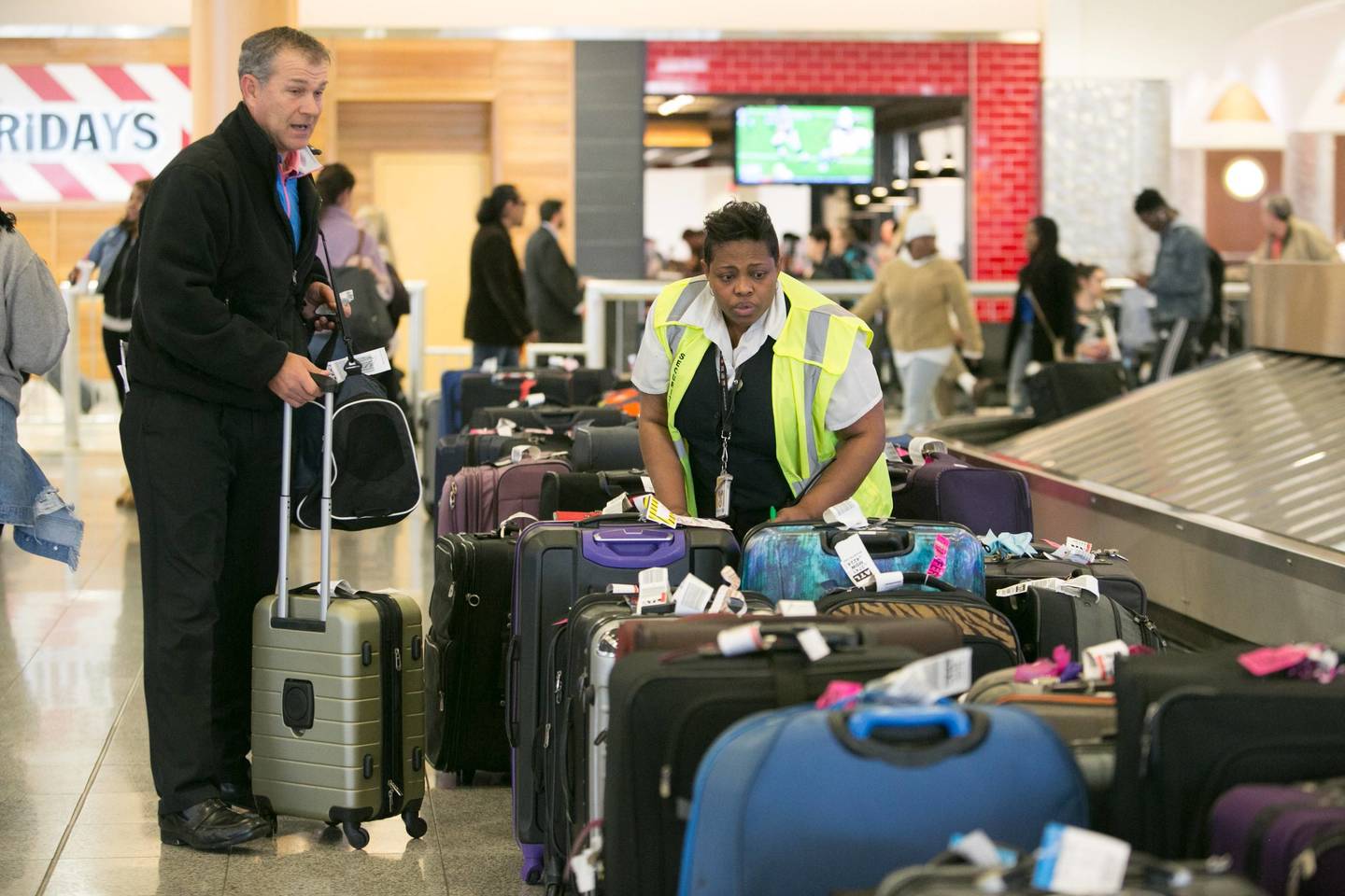 Amerikos pareigūnai sako, kad sistema atnaujinta siekiant keliautojams suteikti aiškesnių rekomendacijų.<br> AFP/Scanpix nuotr.