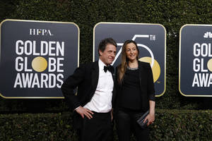 Penkto vaiko tėvu tapsiantis Hugh Grantas rėžė, kad netiki santuoka