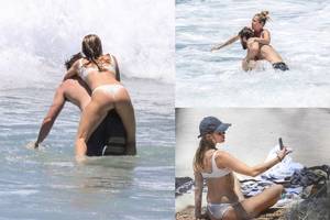 Su mylimuoju atostogaudama Miley Cyrus paplūdimyje dūko it paauglė