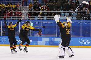 Kanados ir Vokietijos ledo ritulininkai išplėšė kelialapius į žaidynių pusfinalį