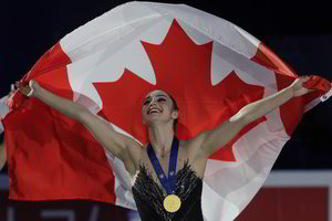 Drama ant Milano ledo: olimpinė čempionė rusė krito, triumfavo kanadietė