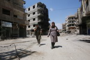 Įtampa Sirijoje pasiekė piką, bet lyderiai blaškosi