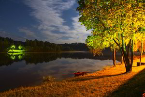 Žiūrėkite po kojomis – šiame Lietuvos kurorte žolę pjauna robotai