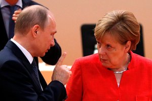 V. Putinas ir A. Merkel per pokalbį akcentavo būtinybę išsaugoti Irano branduolinį susitarimą