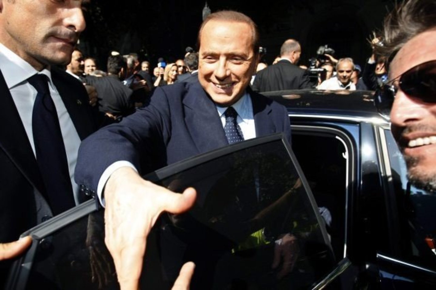 S.Berlusconi vėl galės užimti politinį postą.<br>Reuters/Scanpix nuotr.