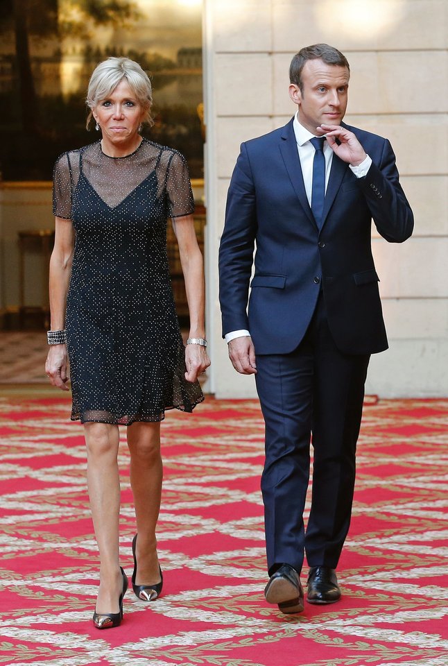  Emmanuelis Macronas ir Brigitte Macron.<br> Scanpix nuotr.
