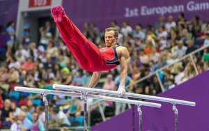 Po penkių operacijų pakilęs gimnastas veržiasi į Tokijo olimpines žaidynes