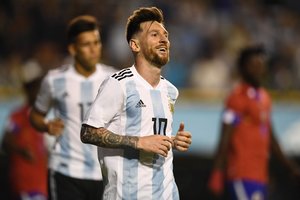 Į nacionalinę rinktinę grįžęs L.Messi prilyginamas Dievui