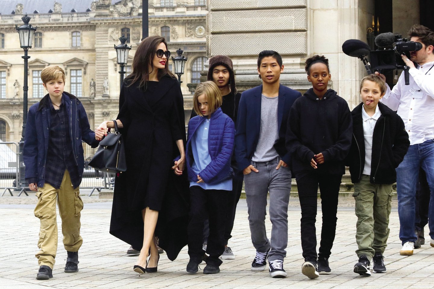  Angelina Jolie su vaikais.<br> Scanpix nuotr.