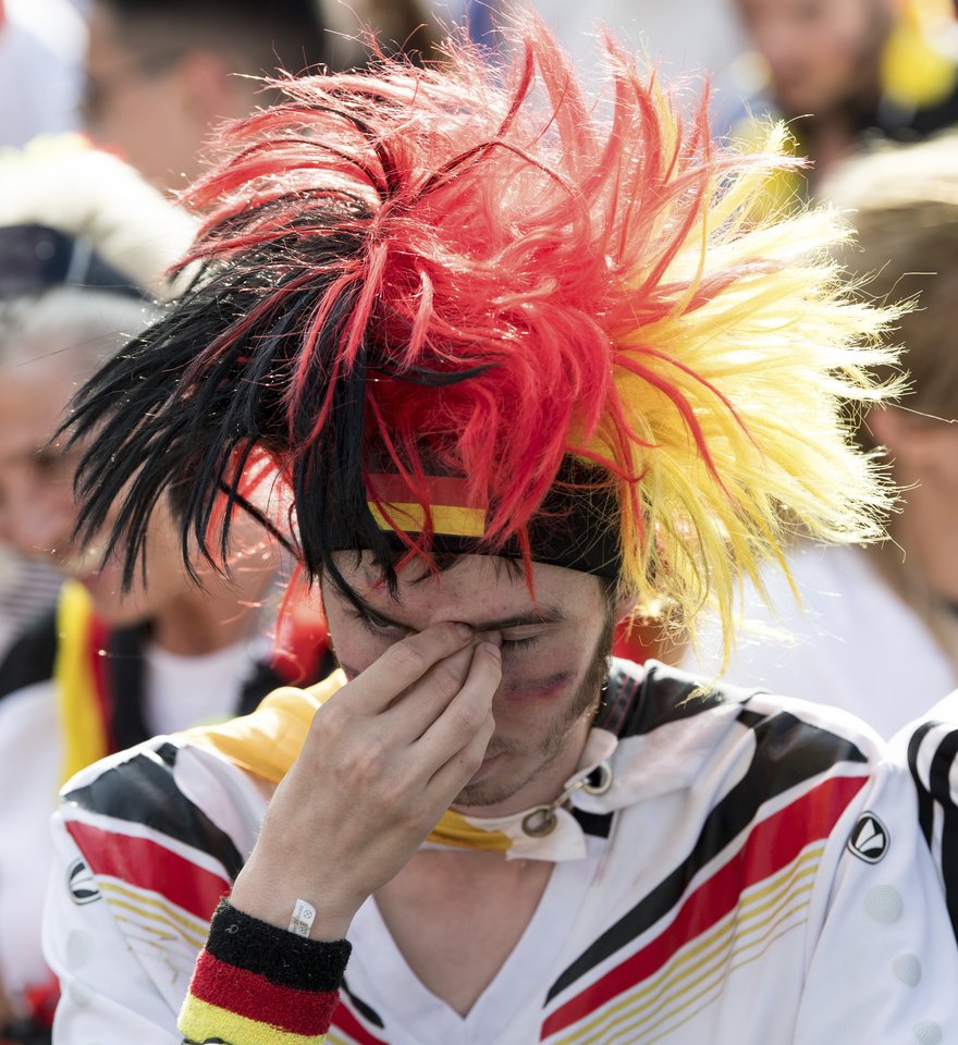  Vokietijos rinktinės sirgaliai liejo ašaras.<br> AP nuotr.