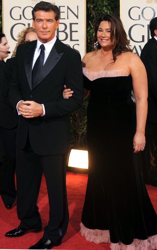  Aktorius Pierce'as Brosnanas su žmona Keely 2009-aisiais.<br> Scanpix nuotr.