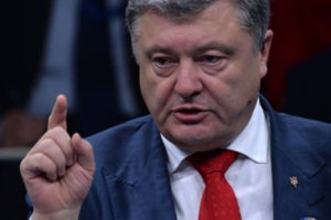 P. Porošenka ragina A. Merkel susitikime su V. Putinu kalbėti ir apie Rusijoje kalinamus ukrainiečius 