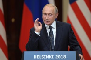 Vladimiras Putinas prieš susitikimą su Angela Merkel išskrido į Austriją ministrės vestuvių