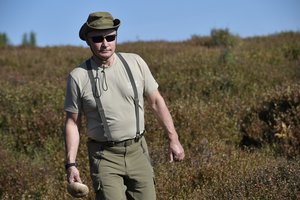 Sibire atostogavęs Vladimiras Putinas nepraleido progos papozuoti fotografams