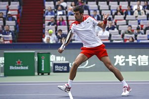 Teniso turnyre Kinijoje užtikrintas pergales šventė favoritai