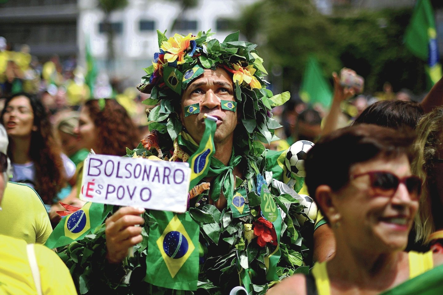 „Bolsonaro yra žmonės“ – tokį šūkį prieš rinkimus mitinguose skandavo šį kandidatą remiantys brazilai.<br>AFP/„Scanpix“ nuotr.