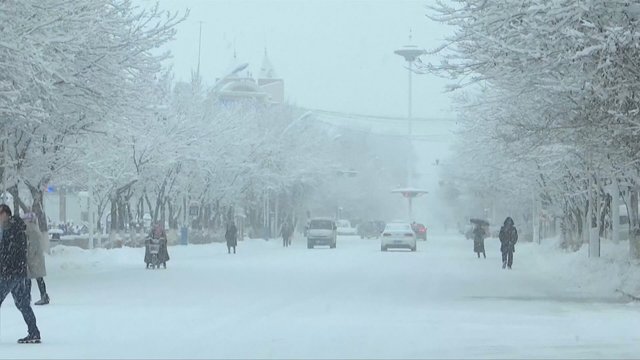 Kiniją paralyžiavus sniegui, Pekinas įžvelgia neįtikėtiną naudą