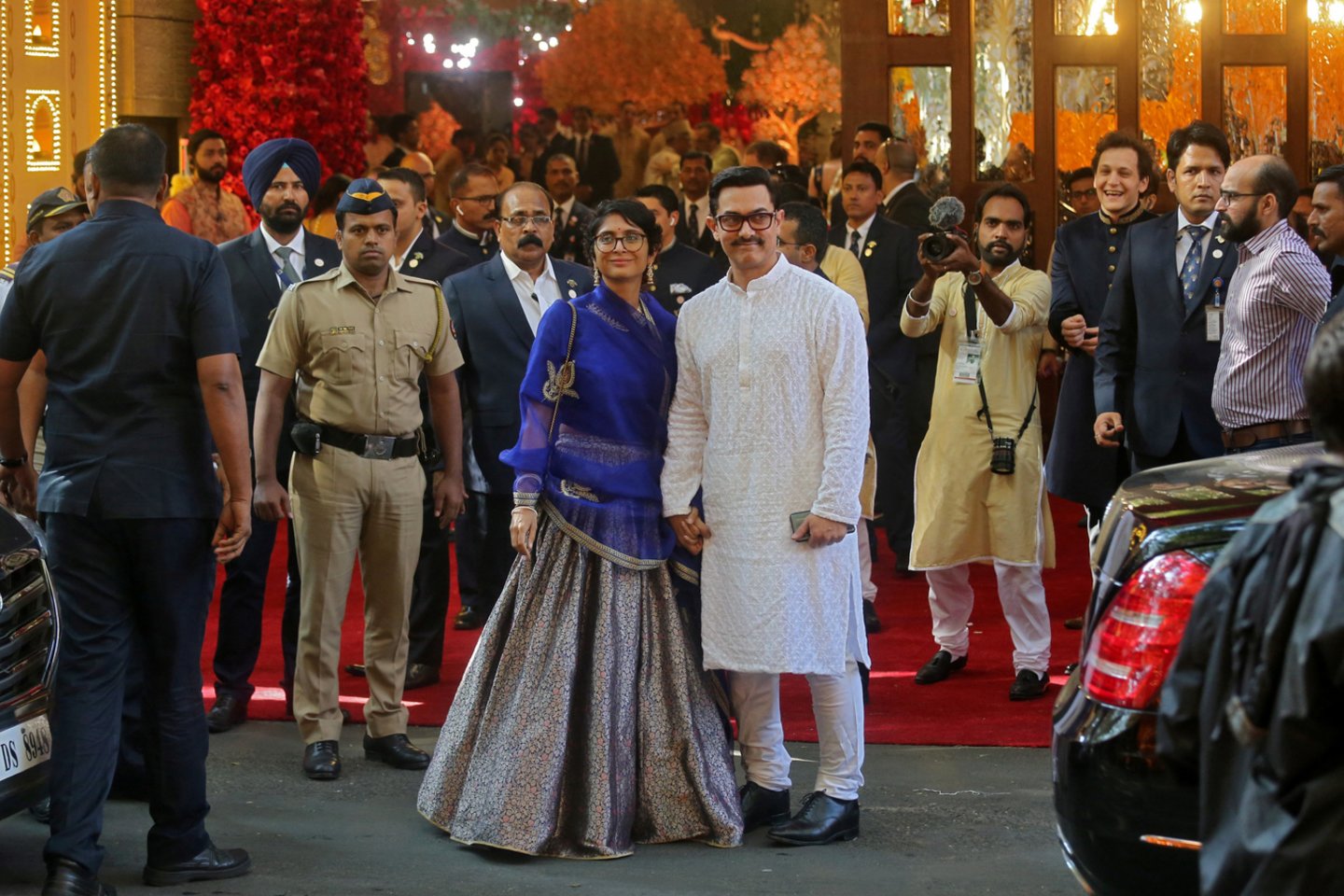 Tarp 600 į vestuves pakviestų svečių - politikai ir aktoriai.<br> Reuters/Scanpix nuotr.
