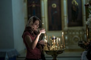 Ukrainos ortodoksų lyderis pirmojoje liturgijoje paragino šalį vienytis 