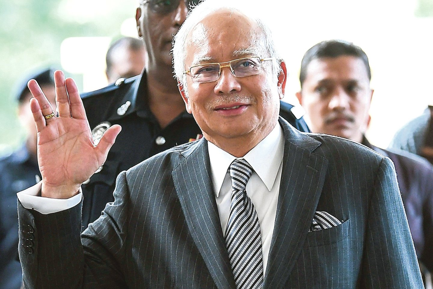 Buvęs Malaizijos premjeras N.Razakas, kaltinamas milžiniškų lėšų iššvaistymu, sulaikytas rugsėjį.<br>„Scanpix“ nuotr.