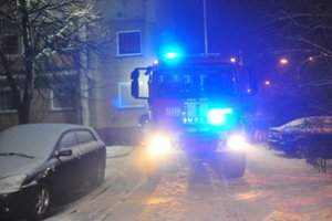 Per gaisrą greta Vilniaus nukentėjo moteris