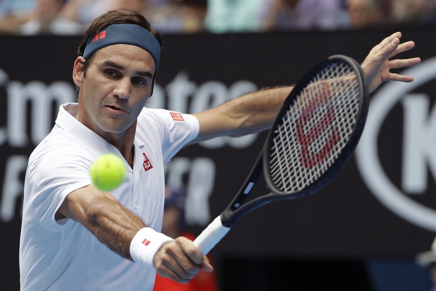  R.Federeris užtikrintai nugalėjo britą D.Evansą.<br> AP nuotr.
