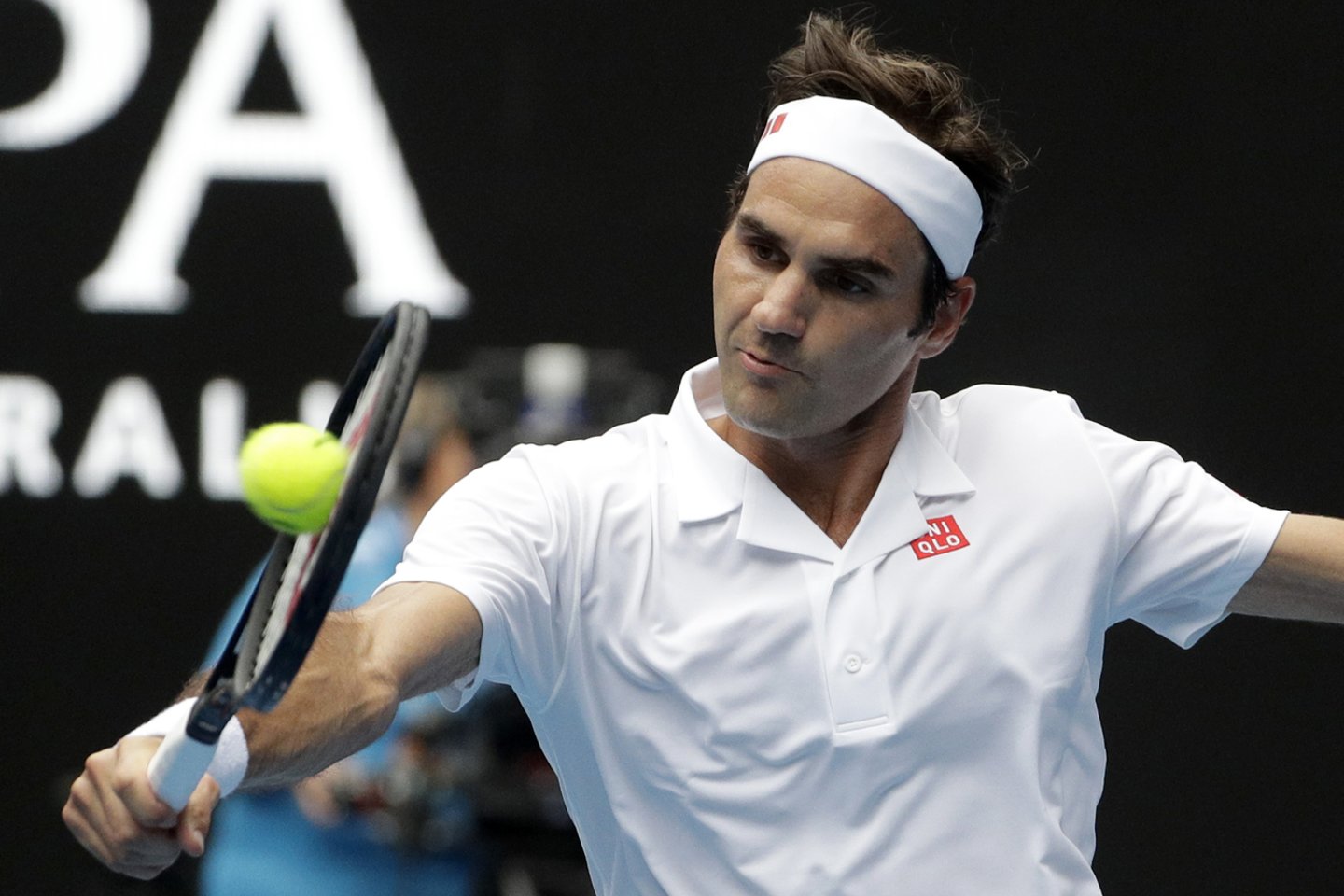  R.Federeris užtikrintai nugalėjo britą D.Evansą.<br> AP nuotr.