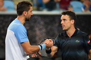 R. Bautista-Agutas kankinačioje keturių valandų kovoje pranoko aukštesnį reitingą turėjusį M. Čiličių 