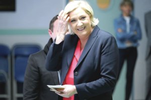 Prancūzijos prokurorai ragina teisti Marine Le Pen už žinutes apie IV