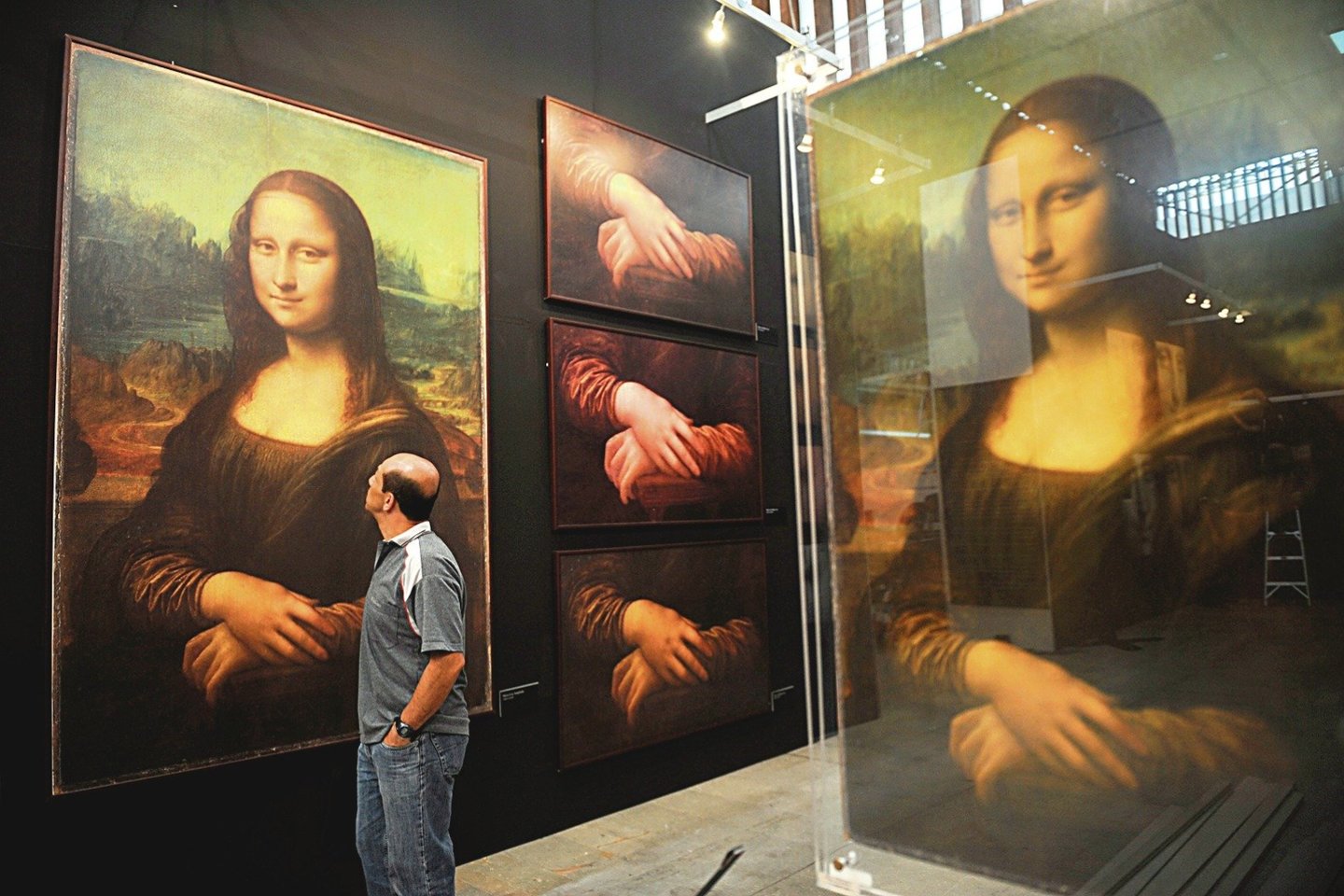 „Džokonda“ („Mona Liza“) – garsiausias ir vienas slėpiningiausių italų genijaus L.da Vinci paveikslų, atpažįstamas kone kiekviename pasaulio kampelyje.<br>AFP/„Scanpix“ nuotr.