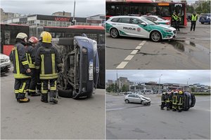 Per susidūrimą Vilniuje viena mašina apvirto ant šono, yra nukentėjusių