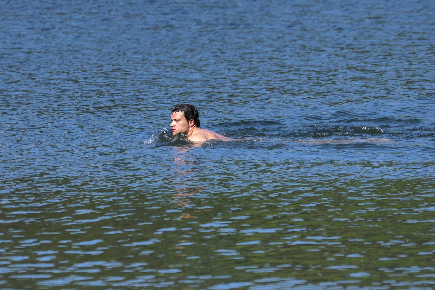 Įkaitę vilniečiai sekmadienį plūdo prie Žaliųjų ežerų<br> V. Ščiavinsko nuotr.