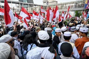 Indonezijos prezidentas perrinktas antrai kadencijai, bet jo varžovas nenori pasiduoti