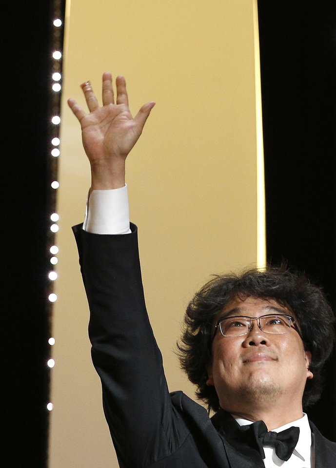 Auksinė palmės šakelė atiteko Pietų Korėjo režisieriui Bongui Joon-ho už filmą „Parazitas“.<br> Scanpix nuotr.