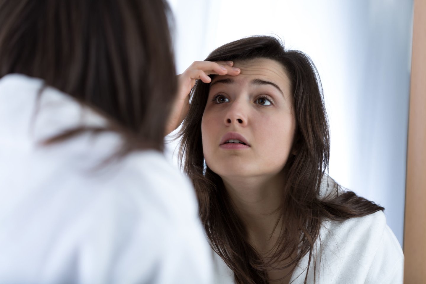 Jeigu staiga suprastėja veido odos būklė, padaugėja spuogų – tai irgi gali signalizuoti, kad intymi sveikata sutriko.<br> 123rf nuotr.