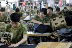 Kinija spaudžia stabdžius – tokio menko ūkio augimo nebuvo tris dešimtmečius