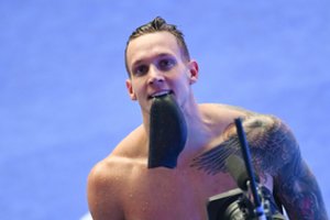 JAV plaukikas C. Dresselis per vakarą iškovojo tris pasaulio čempionato aukso medalius