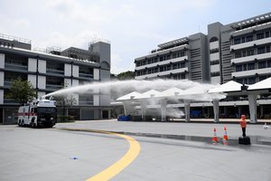 Po naujų protestų Honkonge policija pademonstravo vandens patrankas