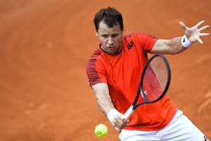Tenisininkas R. Berankis Vankuveryje pralaimėjo pirmą dvejetų mačą