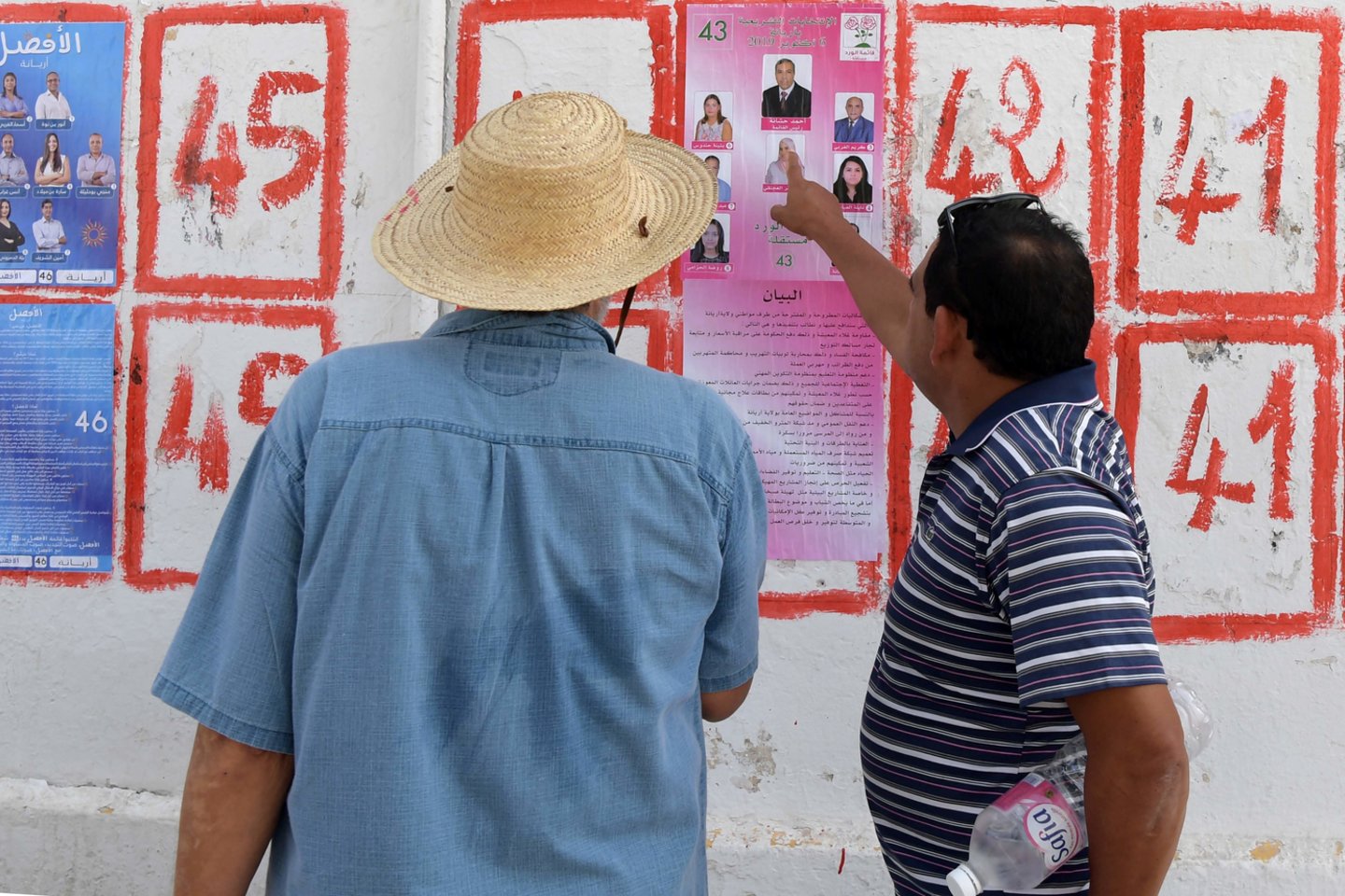 Tuniso prezidento rinkimai buvo planuojami lapkritį, tačiau liepos 25-ąją mirus šios Šiaurės Afrikos valstybės vadovui Beji Caidui Essebsiui balsavimą teko paankstinti.<br>Scanpix/AFP nuotr.