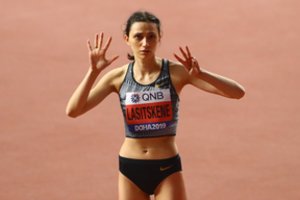 Apkartęs trečiąkart pasaulio čempionės rusės M. Lasickienės triumfas – be vėliavos ir be šalies himno