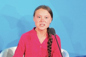 G. Thunberg pašiepė V. Putino komentarus apie „gerą mergaitę“