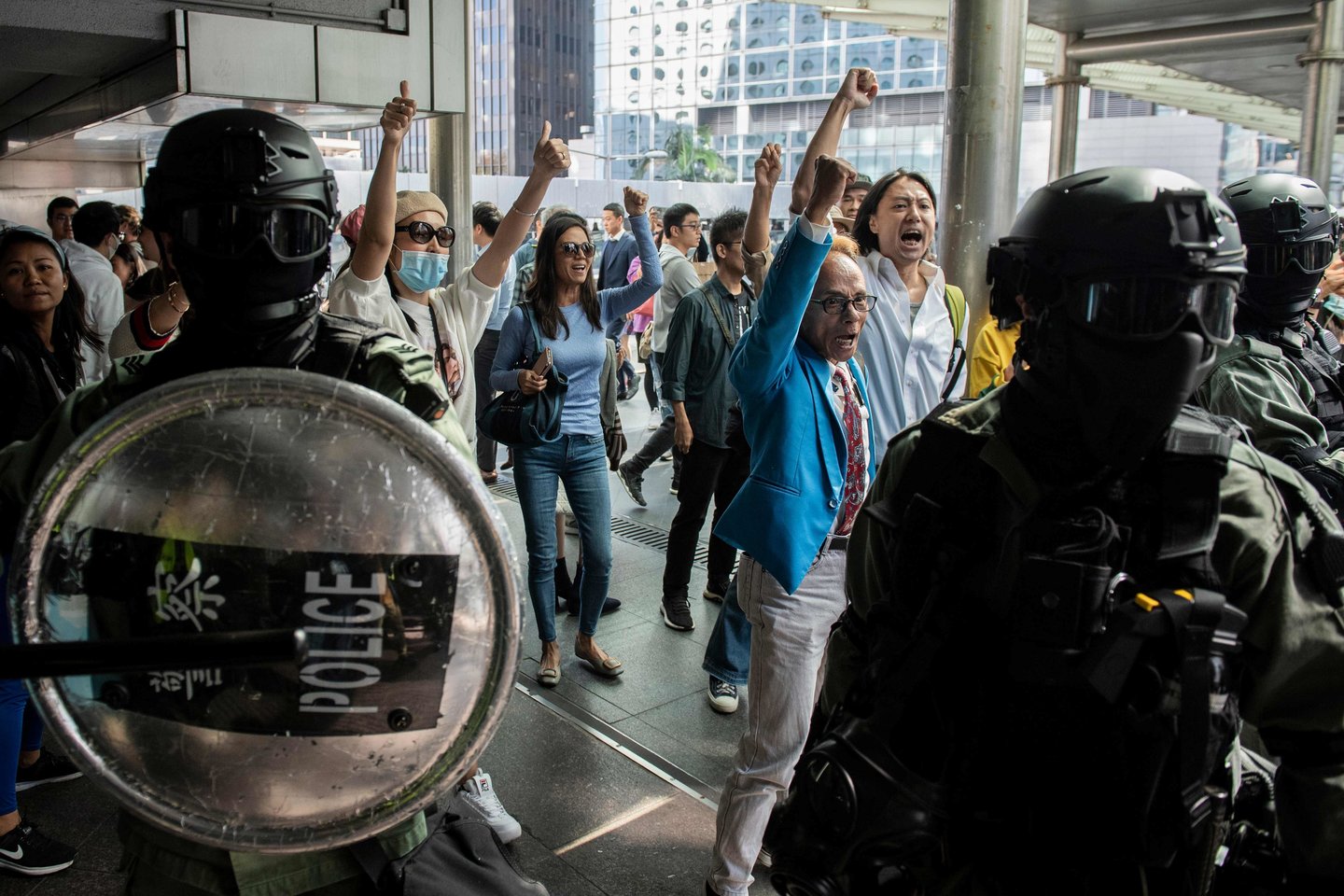   ​Honkonge per vietos valdžios rinkimus šį savaitgalį balsavimo vietose budės policijos pajėgos, teritorijoje vykstant antivyriausybiniams protestams.<br>AFP/Scanpix nuotr.