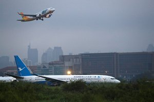 Filipinuose dėl artėjančio taifūno uždaromas Manilos tarptautinis oro uostas