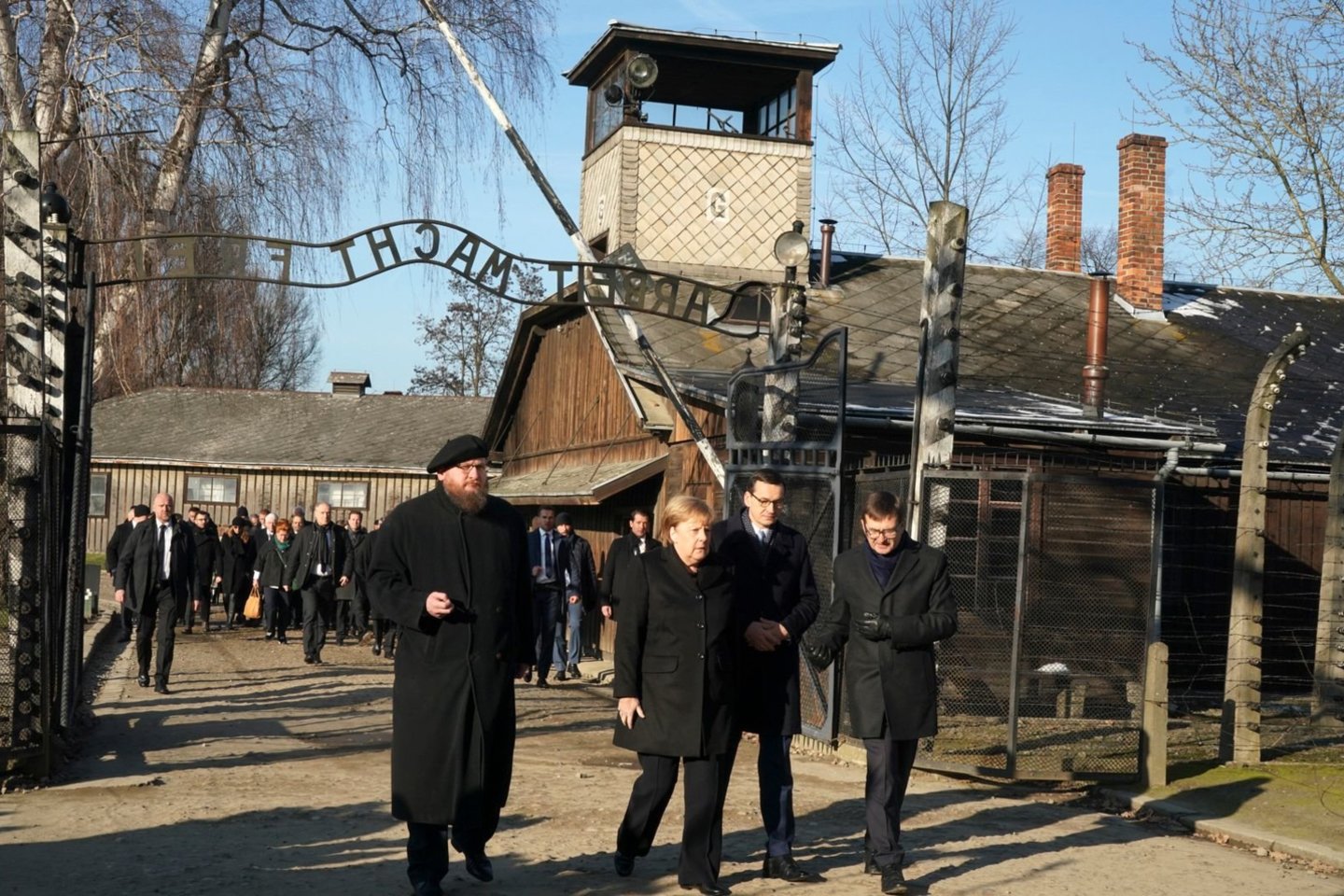  A. Merkel pirmą kartą apsilankė buvusioje Aušvico mirties stovykloje.<br> AFP/„Scanpix" nuotr.