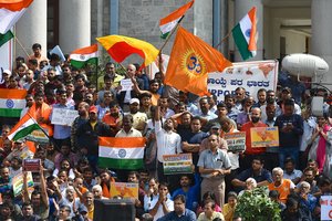 Indijoje didėjant protestų aukų skaičiui, premjeras mitinge gynė pilietybės įstatymą