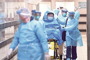 Tailande antivirusinių vaistų kokteiliu moteris sėkmingai išgydyta nuo koronaviruso