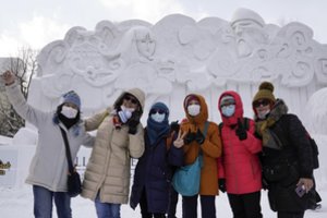 Legendinis Sapporo sniego festivalis Japonijoje šiais metais vyksta be savo sniego