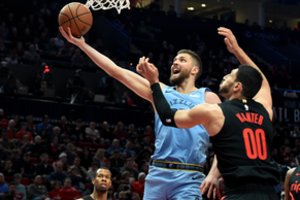 Dvigubą dviženklį surinkęs J. Valančiūnas kėsinosi į rekordą