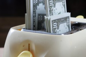 JAV dolerio kursas kopia aukštyn daugumos pagrindinių valiutų atžvilgiu